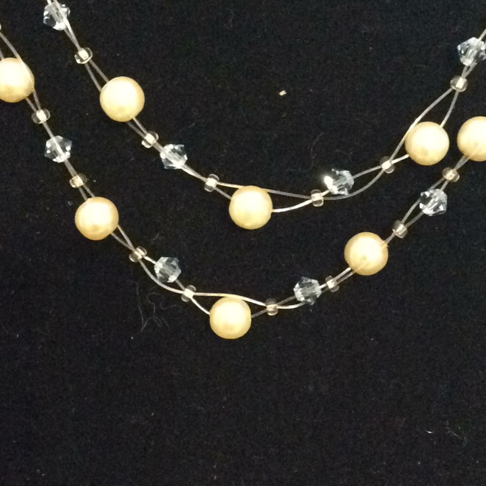 Ivory pearls and light baby blue crystal illusion